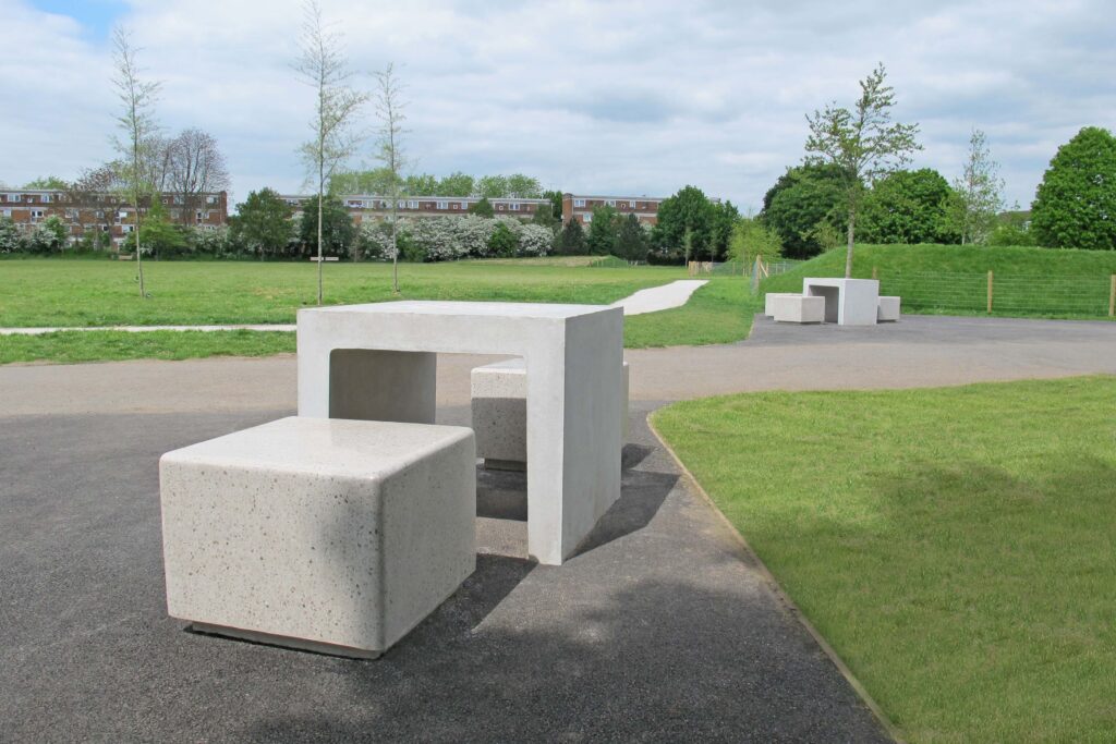Concrete table and cube bench in park