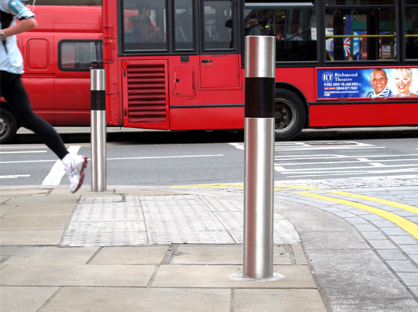 FURNITUBES TRL900 SS Transport stainless steel bollard with black tape, installed in Wimbledon, London