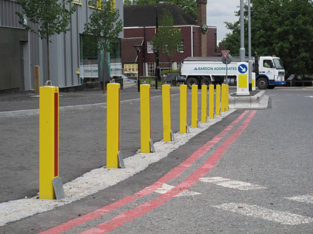 Row of yellow bollards