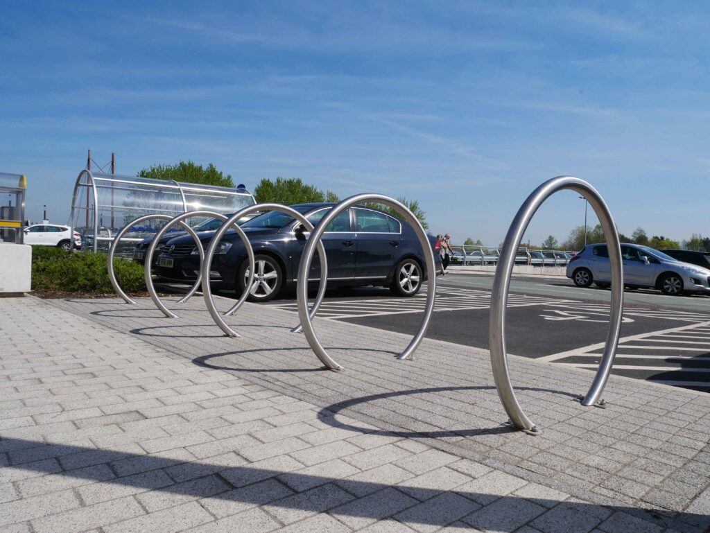 omega cycle stands stainless steel in a row