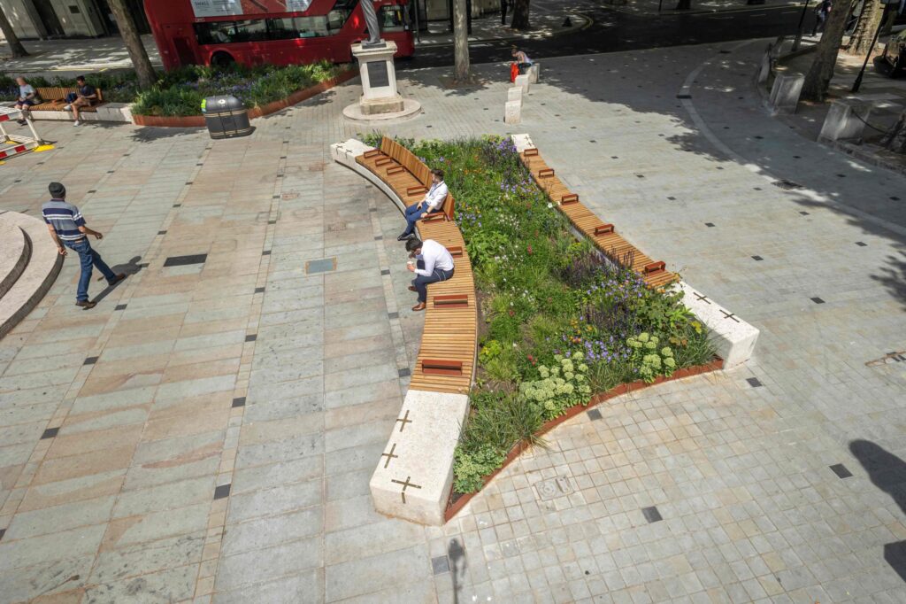 birds-eye-view-of-pedestrians-sitting-on-AKRI-on-lunch-break-at-strand