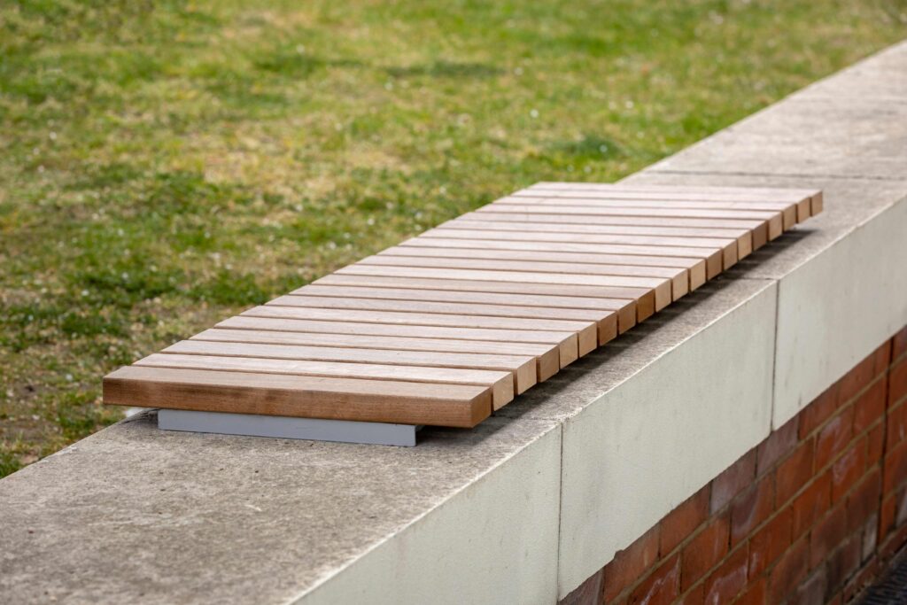 timber slats on contor wall top seat at UEL stratford campus