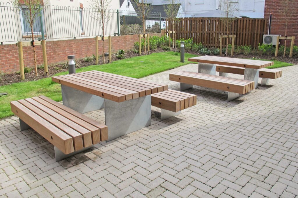 Steel and timber table and benches in university courtyard